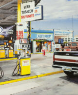 A yellow gas station selling beers, tobacco and souvenirs