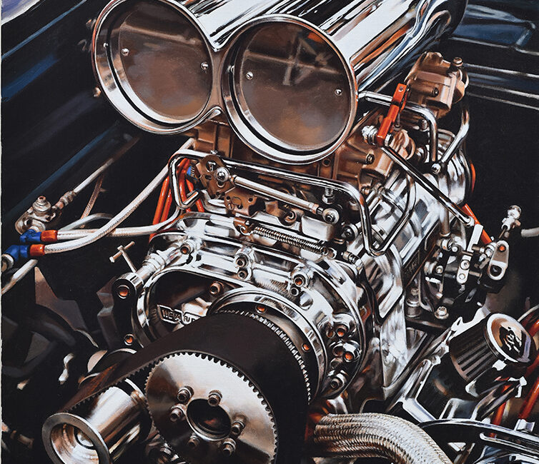 an engine with a chrome-plated scoop on top