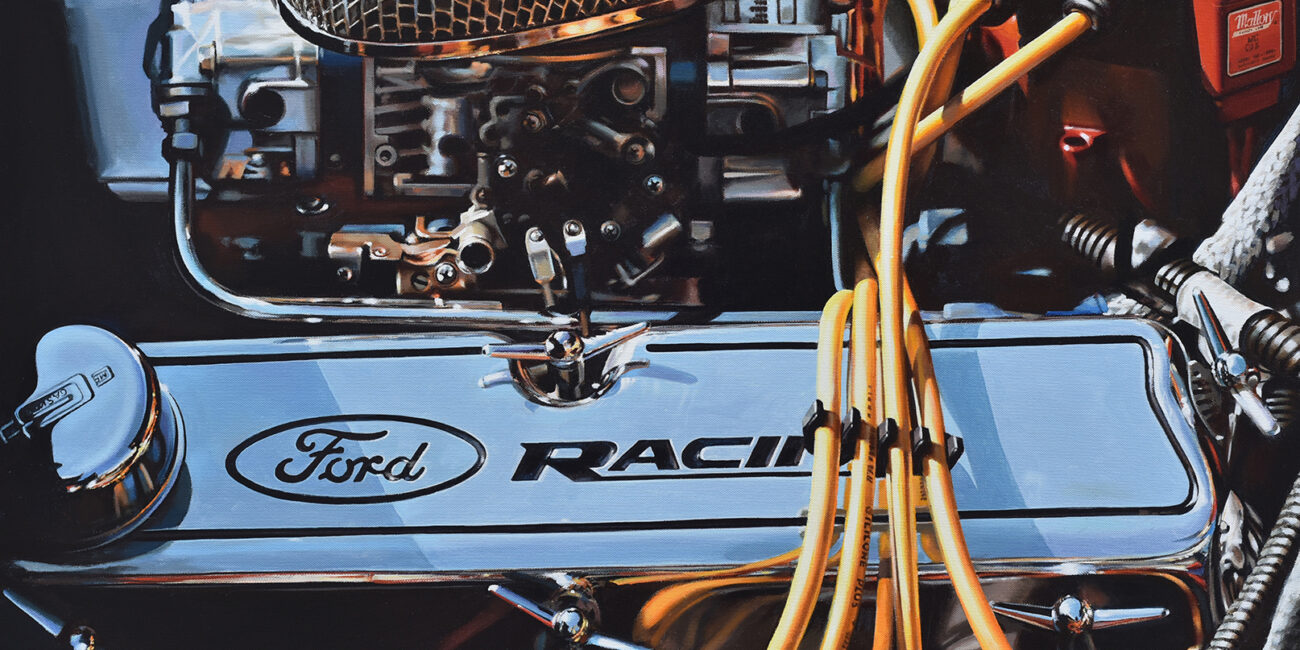 The engine of a Ford Racing Shelby with four yellow cables