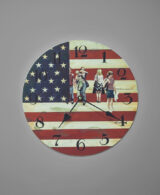 A wooden clock painted in acrylic representing some people walking with an American Flag in the background