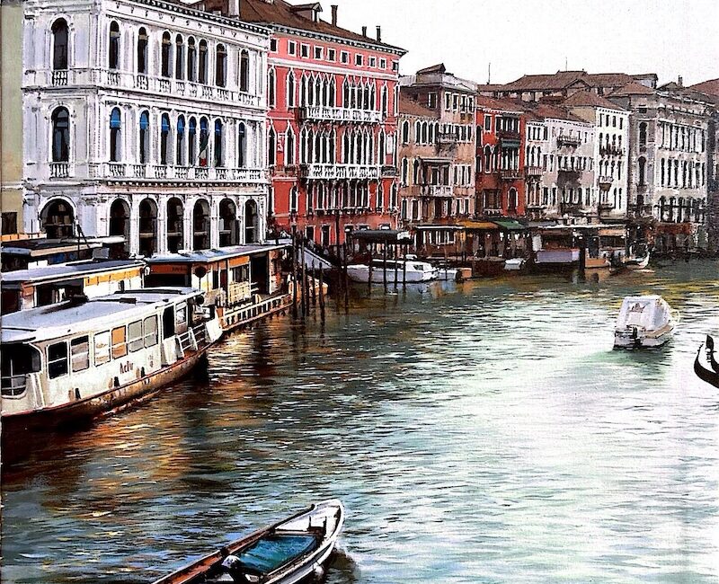 A vaporetto and some boats crossing the Gran Canal in Venice