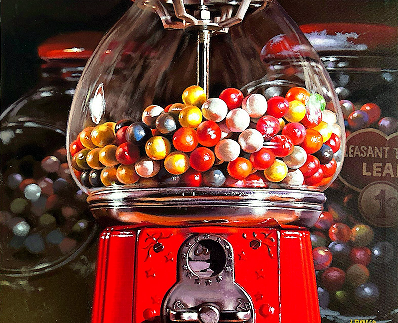 A Gumball Machine with many colored gumballs